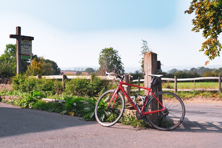 Photo of bike leaning against gate