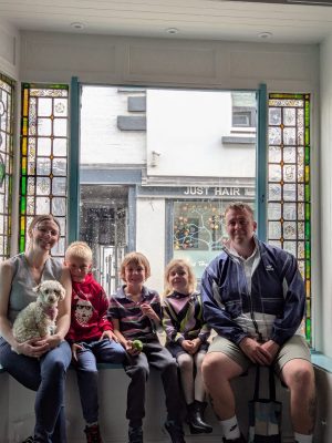 Picture of family in shop window