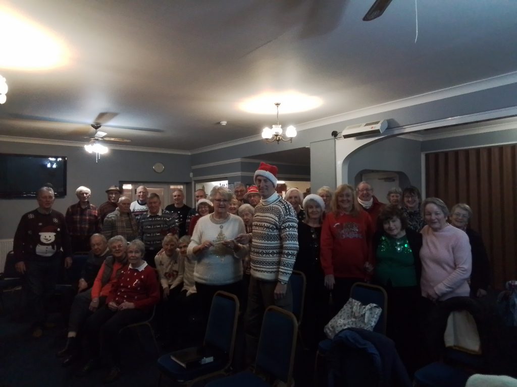 Picture of group with Santa's hats on